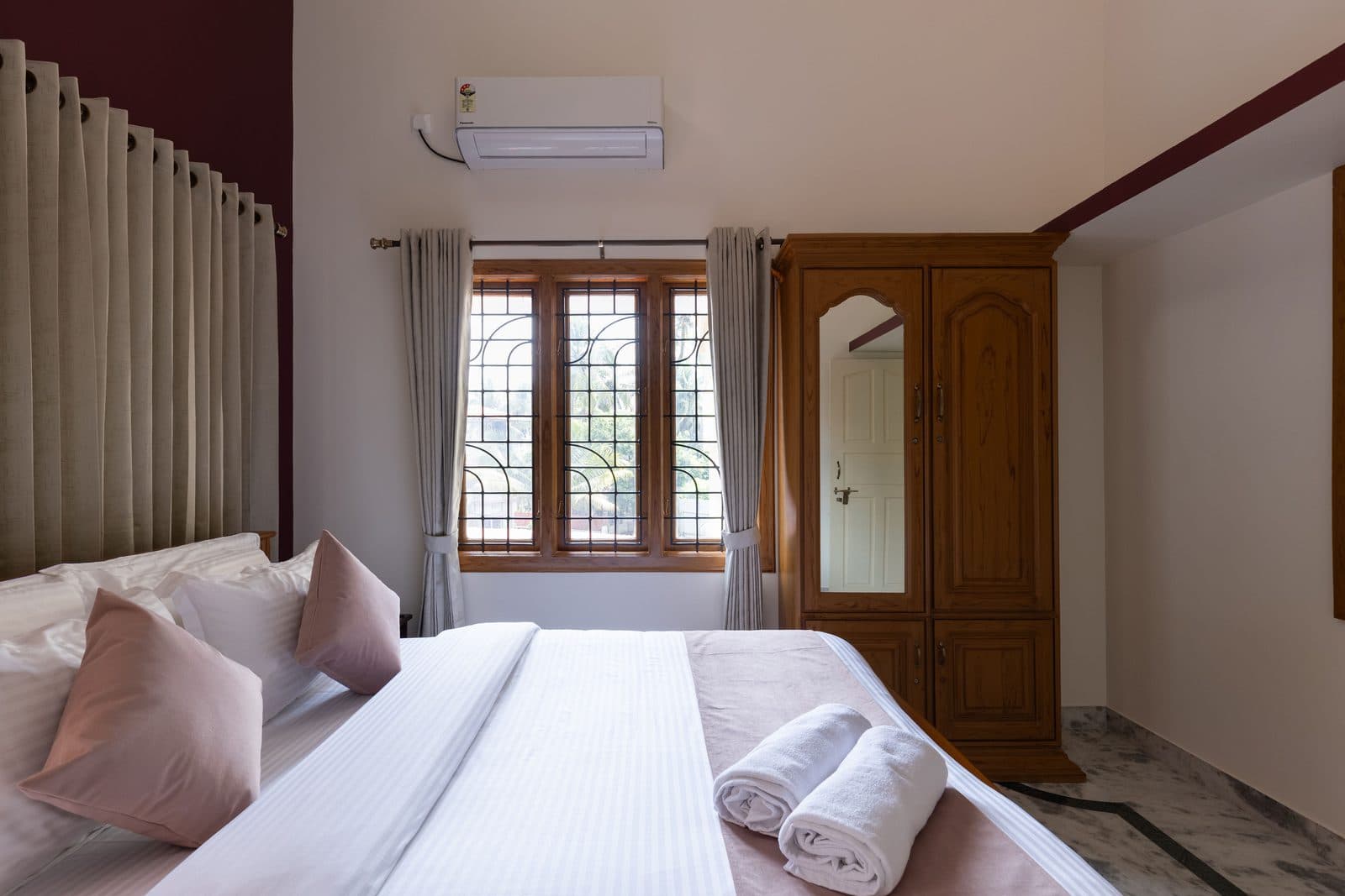 Room 3 from the head of the bed, with the window and the wardrobe