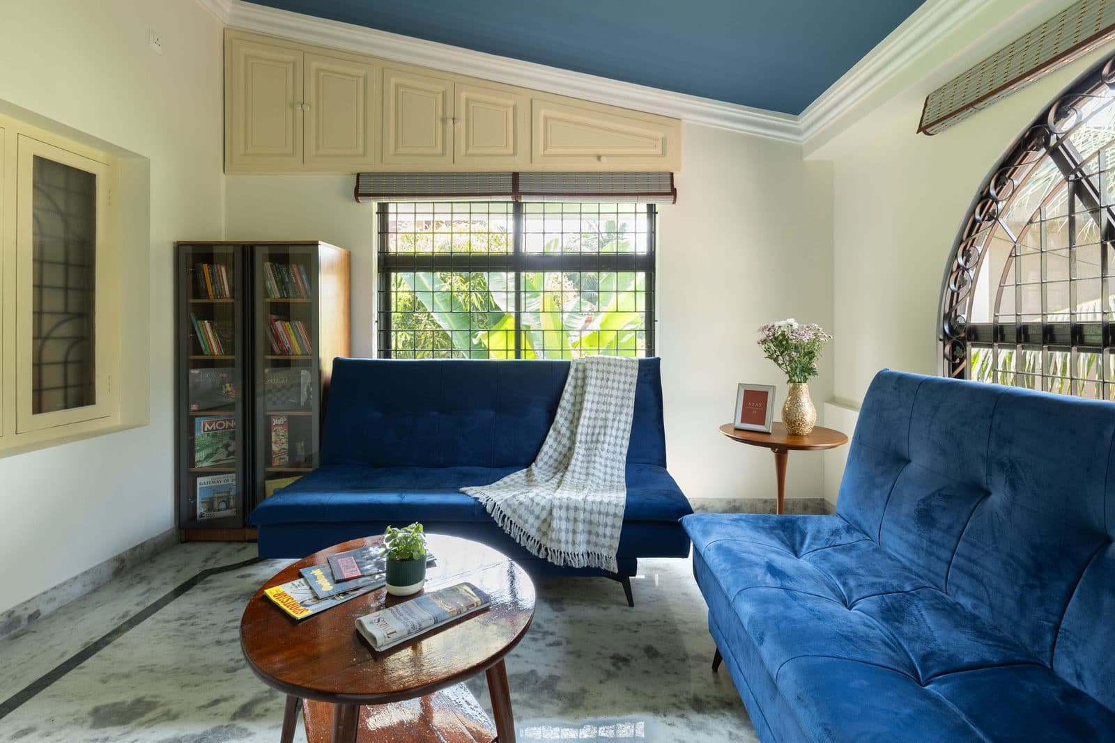 The private lounge from the other end, with the windows and the arched window above the seating